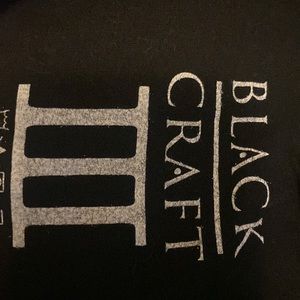 Two shirts one from Black Craft And the other one I have no idea